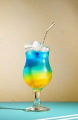 Tropical gradient cocktail , summer beach drink, refreshing and colorful