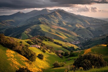 Rolling hills, vibrant colors, mountain range at sunset