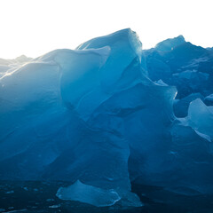 Abstract Photo of Blue Ice Formation with Transparent Layers and Texture