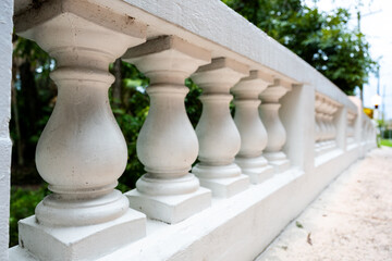 White Concrete Baluster Fence in Historic Architectural Design