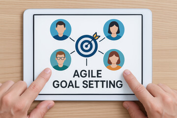 Agile goal setting concept on digital tablet with target and team icons for collaborative planning and achieving objectives in professional setting