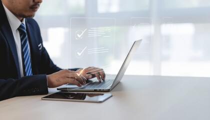Professional businessman approves documents digitally on laptop for efficient workflow and compliance accuracy