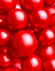 Close-up of many shiny, red spheres, various sizes, overlapping