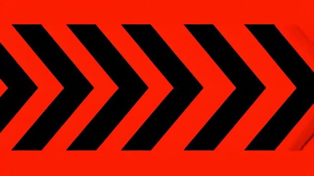 A pattern of black chevrons against a red background