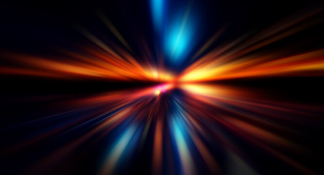 Blurred abstract image featuring luminous bokeh lights in orange and blue hues. Dynamic spots spread on a dark background, suggesting motion and vibrant energy.