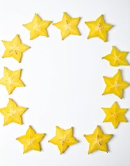 Fototapeta premium Bright Starfruit Slices Artfully Arranged in a Circle on White Background for Freshness