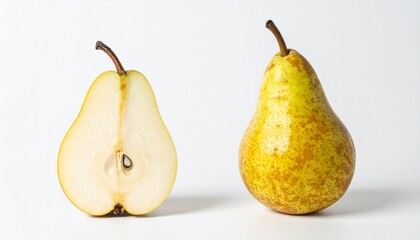 Juicy ripe pear cut in half revealing fresh seeds and sweet flesh, perfect for healthy eating.