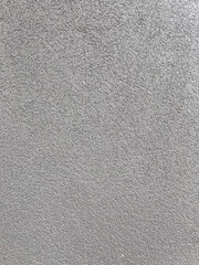 A Simple Uniform Grey Concrete Siding on a Building
