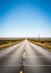 Fototapeta premium Endless highway under clear skies offers a sense of freedom and adventure for travel