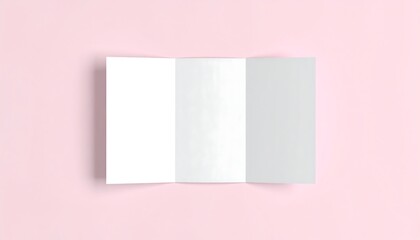 Fototapeta premium Blank trifold brochure mockup template, open and laid flat on a pastel pink background. A clean canvas for corporate branding and design.
