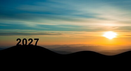 Planning for the future year of twenty twenty seven with a scenic mountain sunset background image