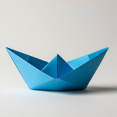 Photo Of A Blue Paper Boat Origami On White Background With Soft Shadows