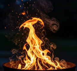 Vibrant flames dance with swirling smoke and glowing embers in a captivating nighttime bonfire, creating a warm, inviting atmosphere perfect for outdoor gatherings and cozy evenings.