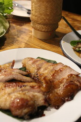 Grilled pork neck is a famous E-san dish