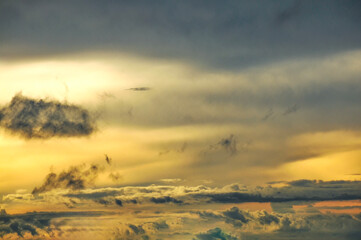 Beautiful storm clouds on a summer night with pinks and blues.