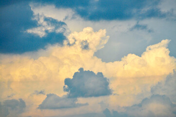 Beautiful storm clouds on a summer night with pinks and blues.