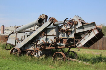 Fototapeta premium old farm tractor in field