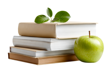 Stacked books with green apple and leaves