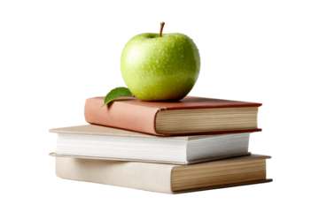 Green apple on a stack of three books