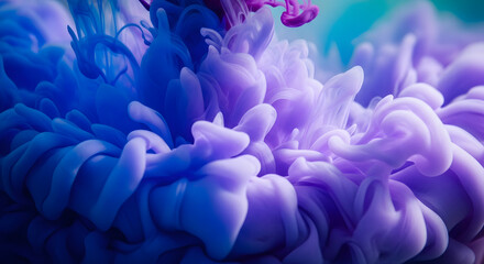 Obraz premium Fluid Dance of Color: A mesmerizing macro photograph showcasing a vibrant dance of swirling blue and purple ink suspended in liquid, creating a surreal and abstract visual experience.
