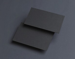 Two black business cards floating on black background Mockup. Blank american size calling card. 3D rendering