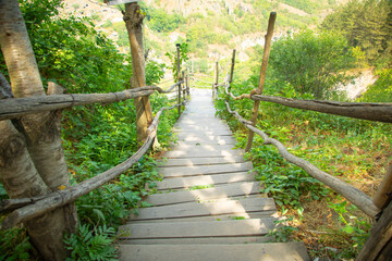 Fototapeta premium Wooden stairs in outdoor. Summer. Armenia