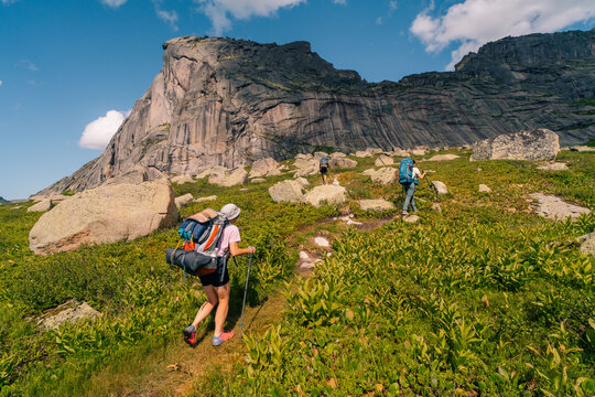 russia, ergaki - 4 august 2025 backpacker on the path in the mountain