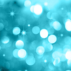 Soft focus aqua blue bokeh lights with subtle sparkle highlights for a dreamy background