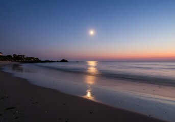 Fototapeta premium Moonlit Beach: Tranquil Coastal Evening Scene
