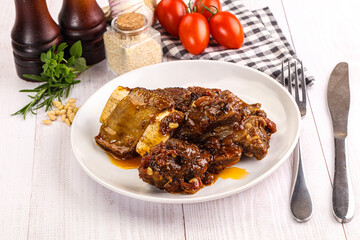 Prepared tasty beef ribs with sauce