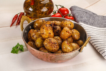Baked mini potato with herbs