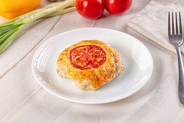 Chicken chop cutlet with cheese and tomato
