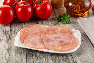 Smoked pork tenderloin fillet slices