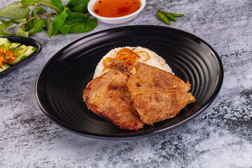 Roasted pork steak with rice