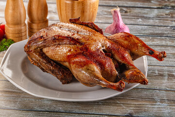 Baked with spices whole duck