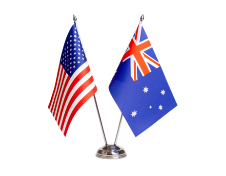 Mini table flags of United States and Australia displayed side by side isolated on white background