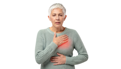 Concerned middle aged woman clutching chest in pain isolated on white background
