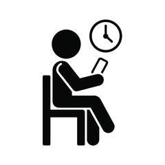 Person sitting and using phone while waiting