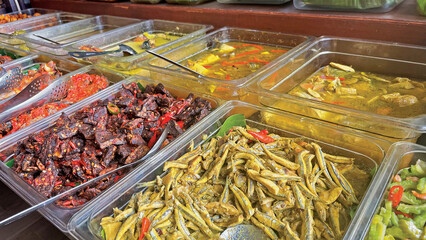 Indonesian street food stall serving traditional homemade dishes