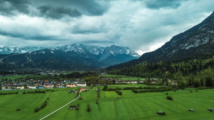 Green meadows and colorful houses