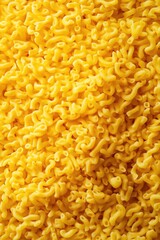 Close-up of uncooked yellow pasta