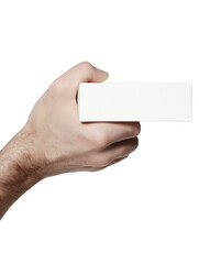 Obraz premium A professionally lit studio photograph of a young adult male hand holding a rectangular product package at a slight angle with the fingertips, isolated on a transparent background