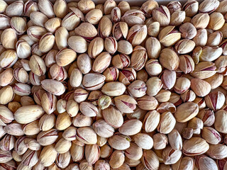 Pistachios photographed from an upper angle. Cooking poster. Flat layout with pistachios.