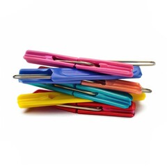 Colorful plastic clothespins stacked