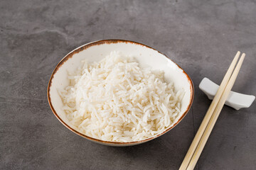 Simple bowl of steamed white rice, ideal side dish for Asian meals