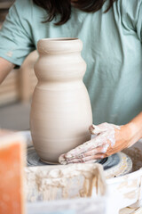 hands of a potter at work