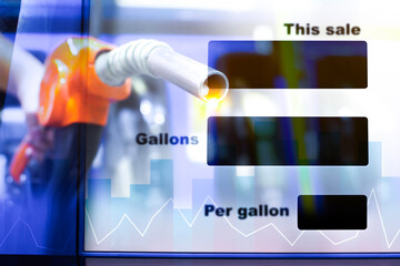 Gas station fuel pump nozzle with digital sale display showing gallons and price per gallon, data chart overlay