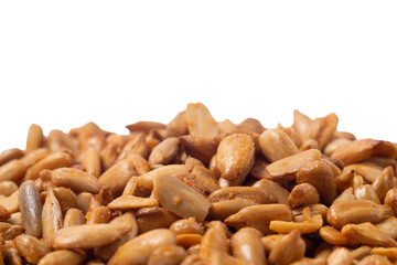 A handful of peeled sunflower seeds in teriyaki sauce on a white background, side view