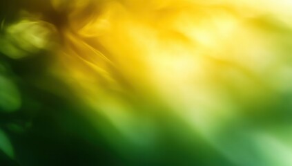 Obraz premium A vibrant abstract image featuring a blend of yellow and green hues, creating a soft, flowing texture that evokes a sense of tranquility.