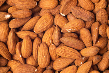Fototapeta premium Almonds as a texture, pattern, background 